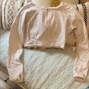Women's Cream Long Sleeve jacket. Crop top fit